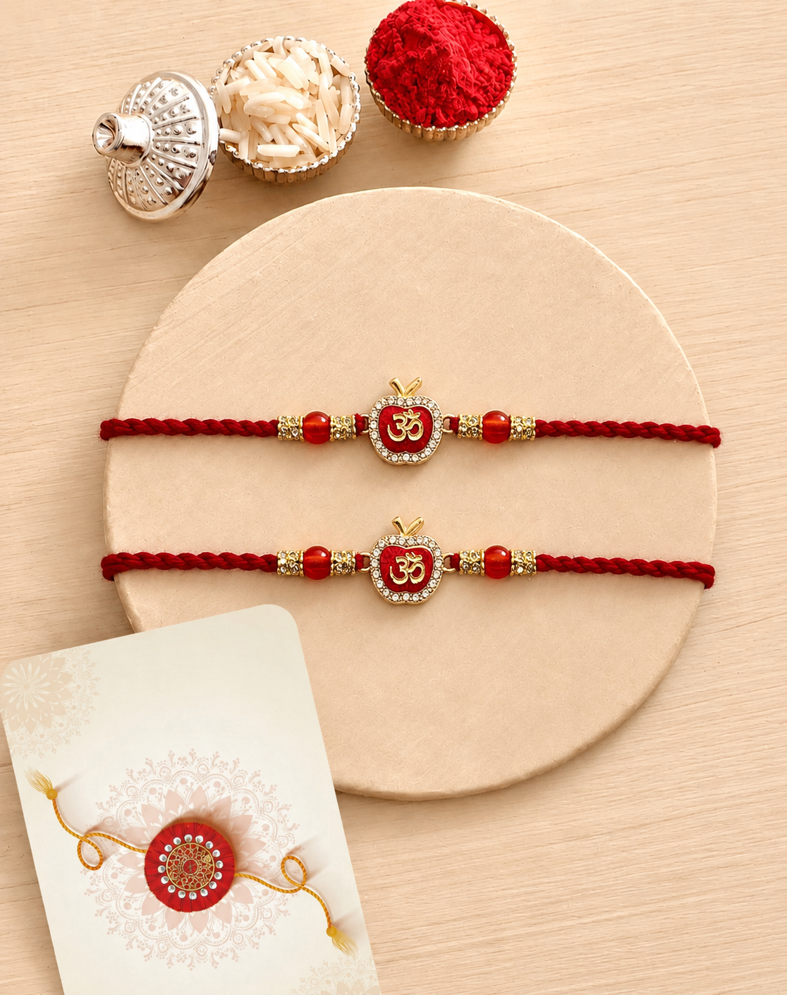 Apple Om Rakhi Pair